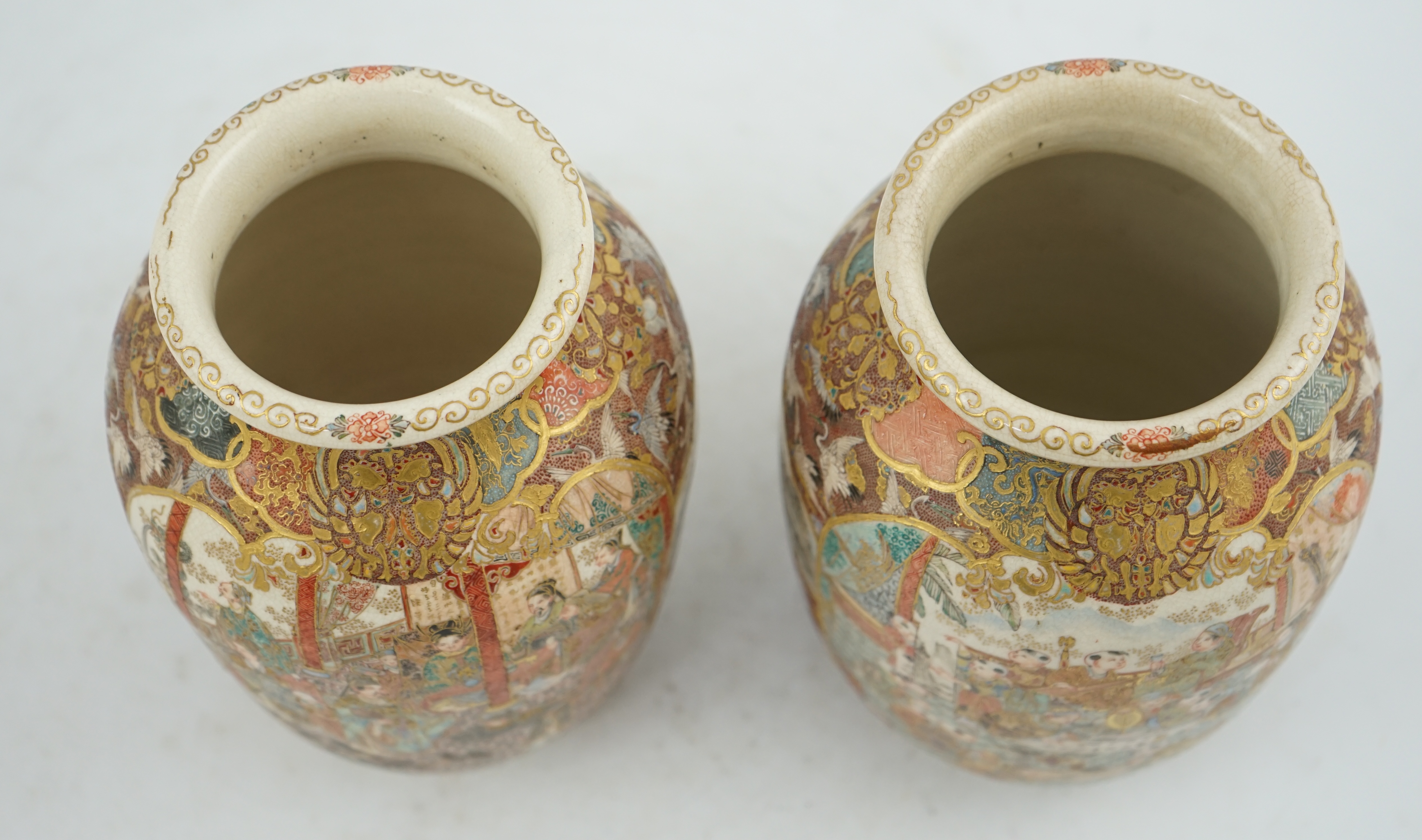 A pair of Japanese Satsuma 'boys' ovoid vases, Meiji period